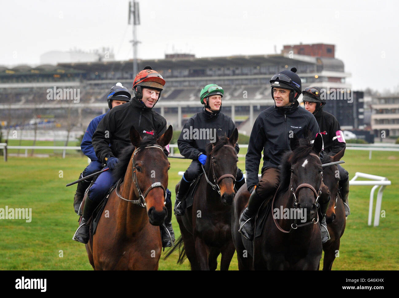 Ruby Walsh (right) rides Final Approach with other horses of trainer Willie Mullins' on the gallops ahead of the Gold Cup Day at Cheltenham Racecourse. Stock Photo