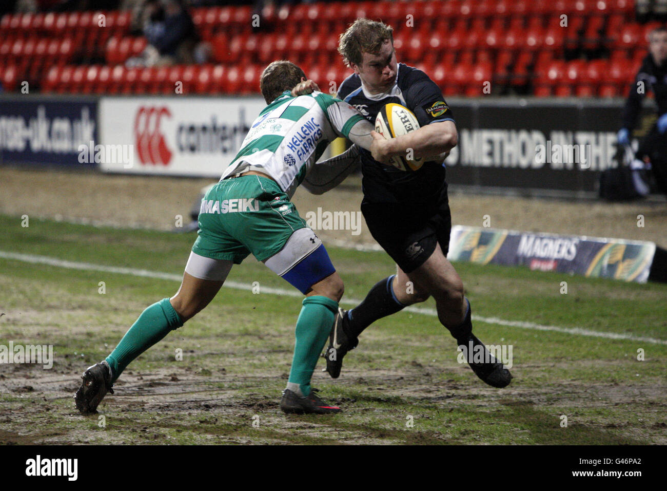 Glasgow Warriors' Fergus Thomson breaks through a tackle from Benetton Treviso Stock Photo