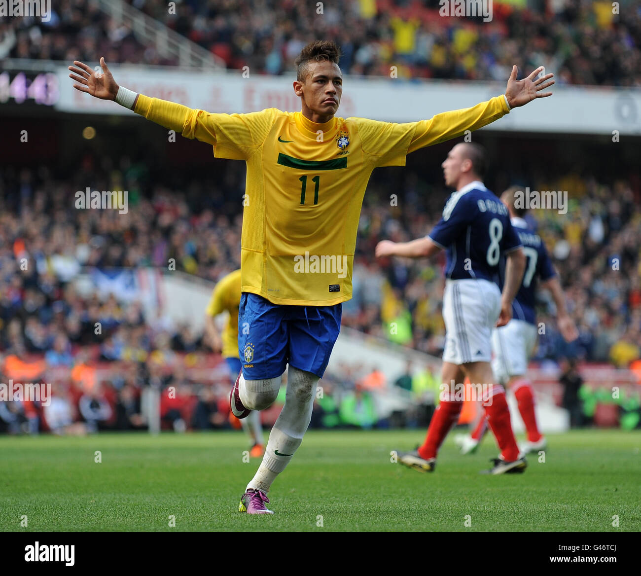 Brazil's Neymar celebrates scoring the opening goal of the game against Scotland Stock Photo
