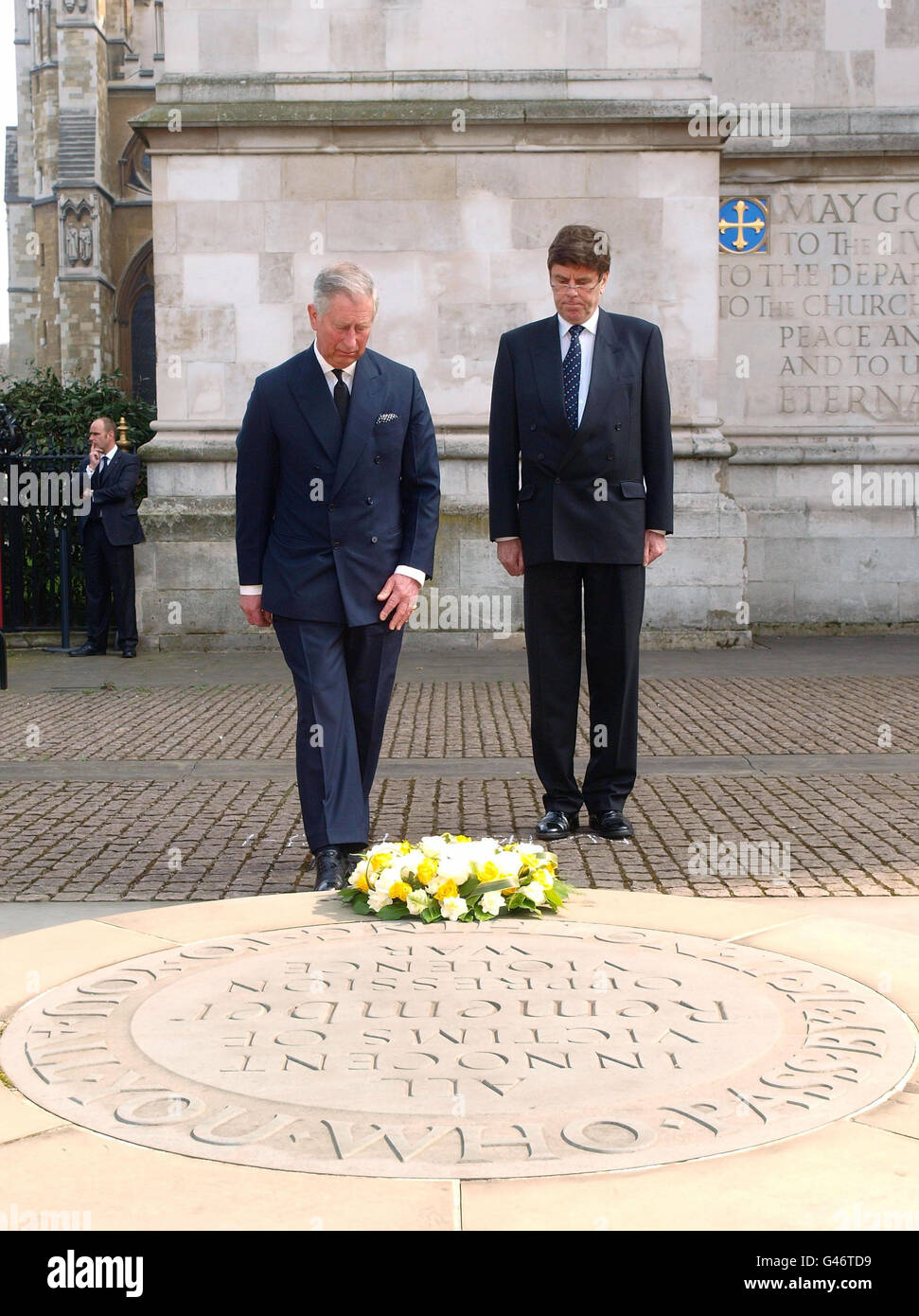 The Prince of Wales lays a wreath with New Zealand High Commissioner Derek Leask, during the Christchurch Earthquake Memorial service at Westminster Abbey, London. Stock Photo