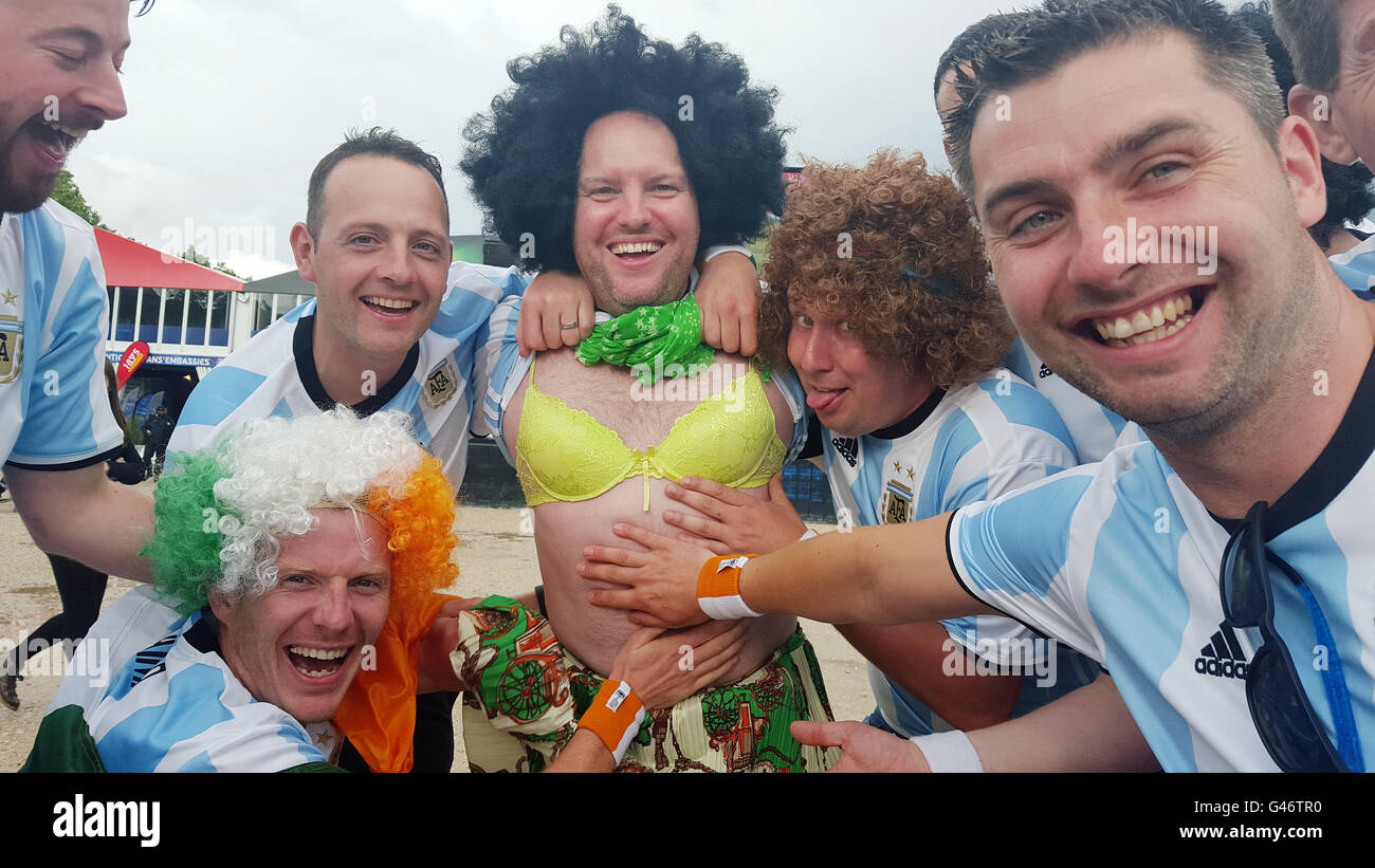 Richard Deegan, 37, (centre) from Dublin with his friends in the fan