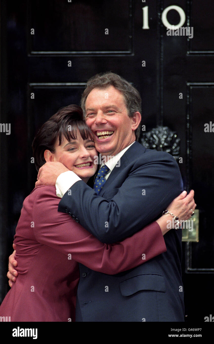 Tony and Cherie Blair embrace infront of No 10 Downing Street this