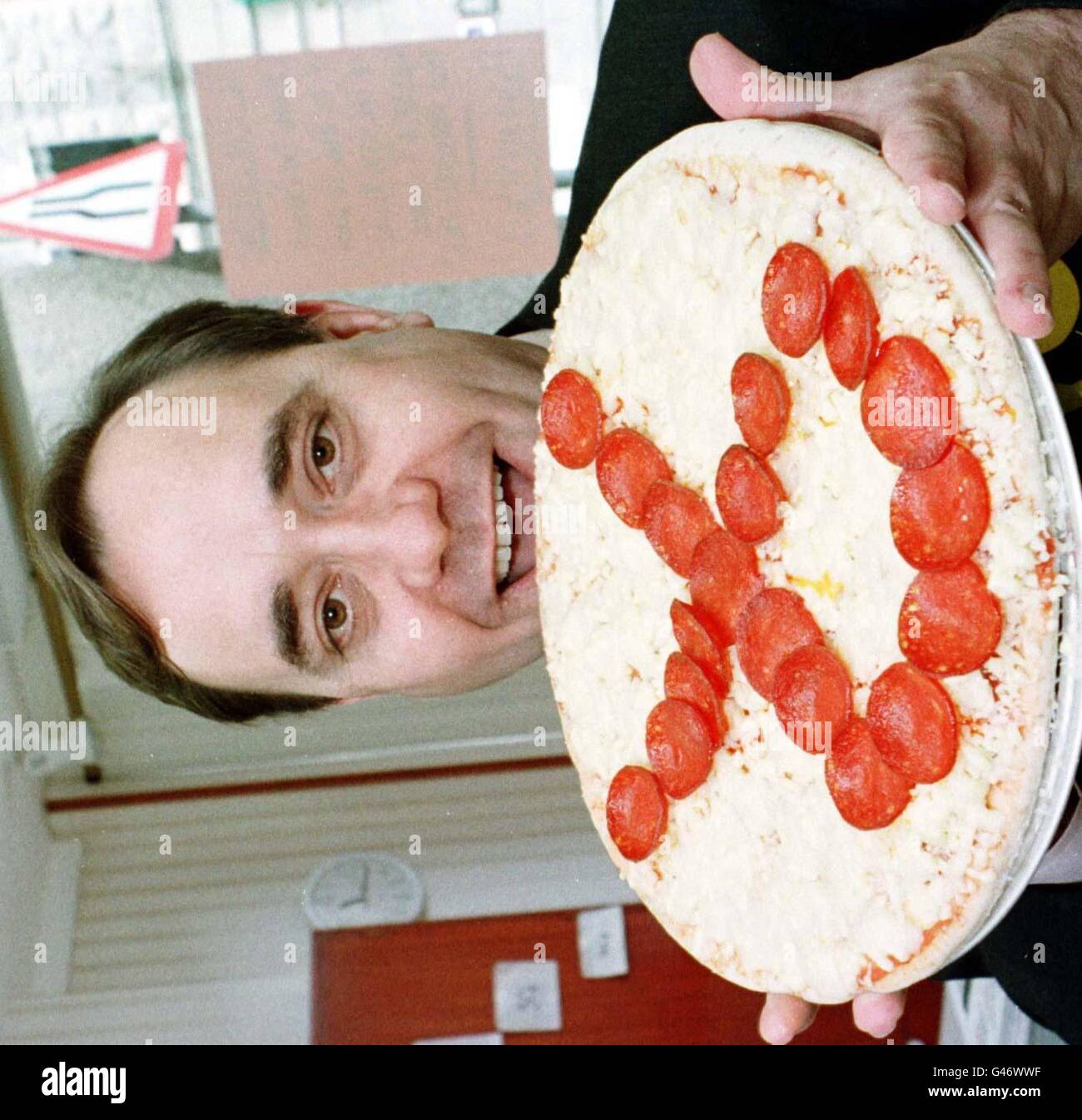 Alex Salmond was presented with this pizza carrying the SNP logo, when he visited a shop in Fraserburgh, Scotland, this morning (Thursday). Earlier Mr Salmond cast his vote in the general election. PA. Stock Photo