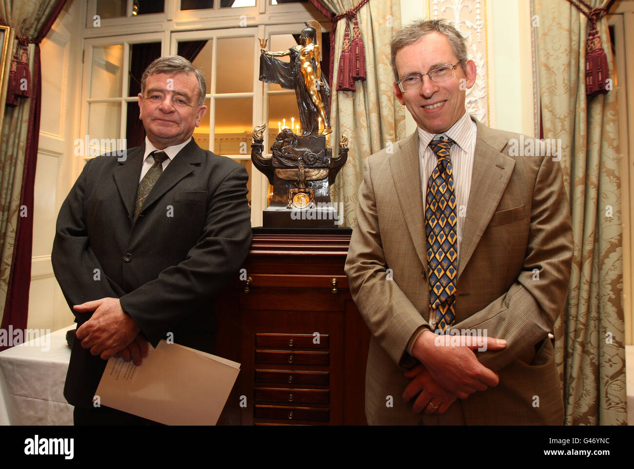 Former winner of the Segrave Trophy in 1998 Brian Milton the Journalist and Microlight pilot (left) and Dr William Brooks (right) at the Royal Automobile Club. Stock Photo