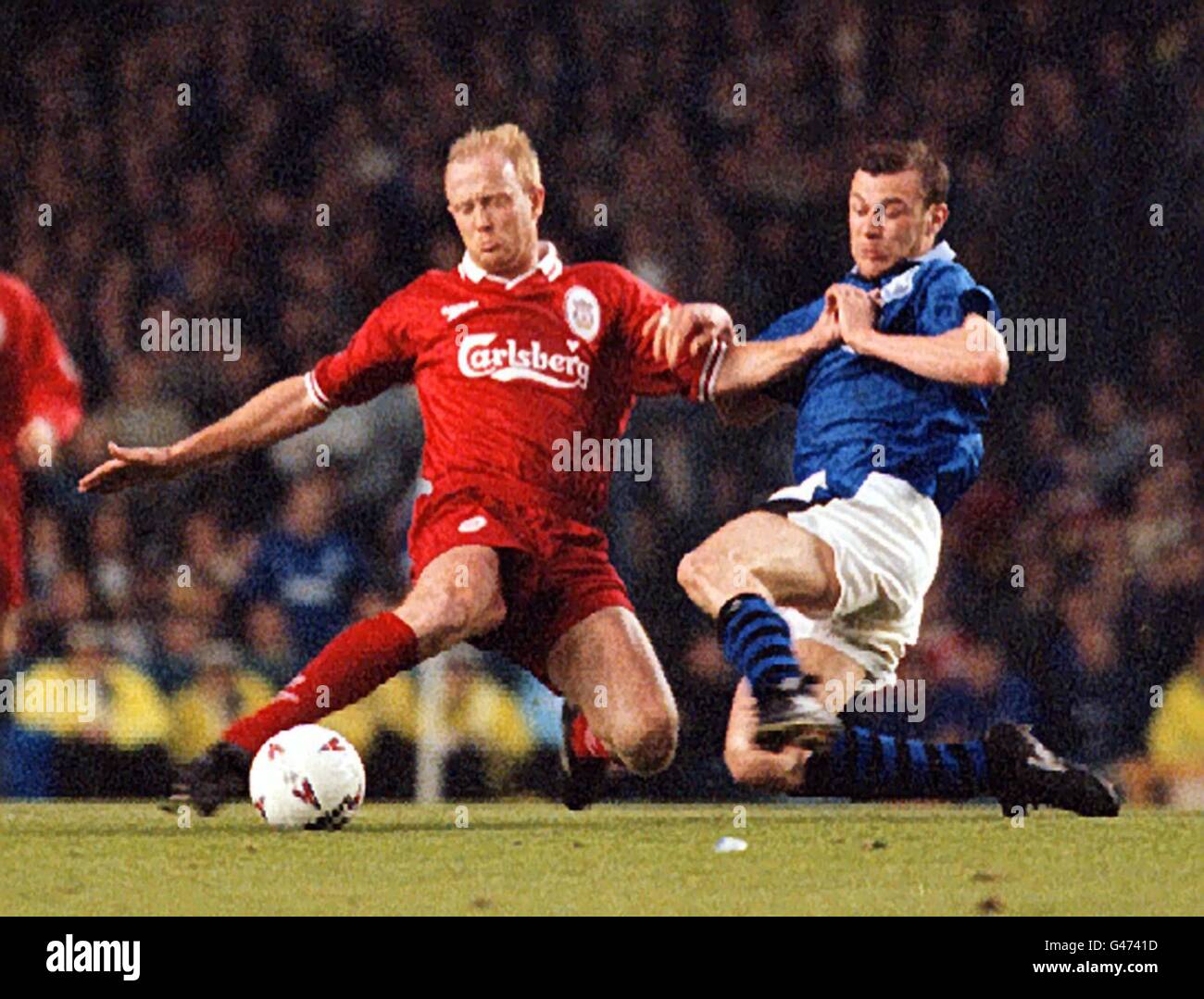 Everton V Liverpool. Liverpool's Mark Wright (left) feels the force of a tackle from Everton's Duncan Ferguson in their FA Carling Premiership Liverpool derby Goodison Park tonight (Wednesday). Photo by Dave Kendall/PA. Stock Photo