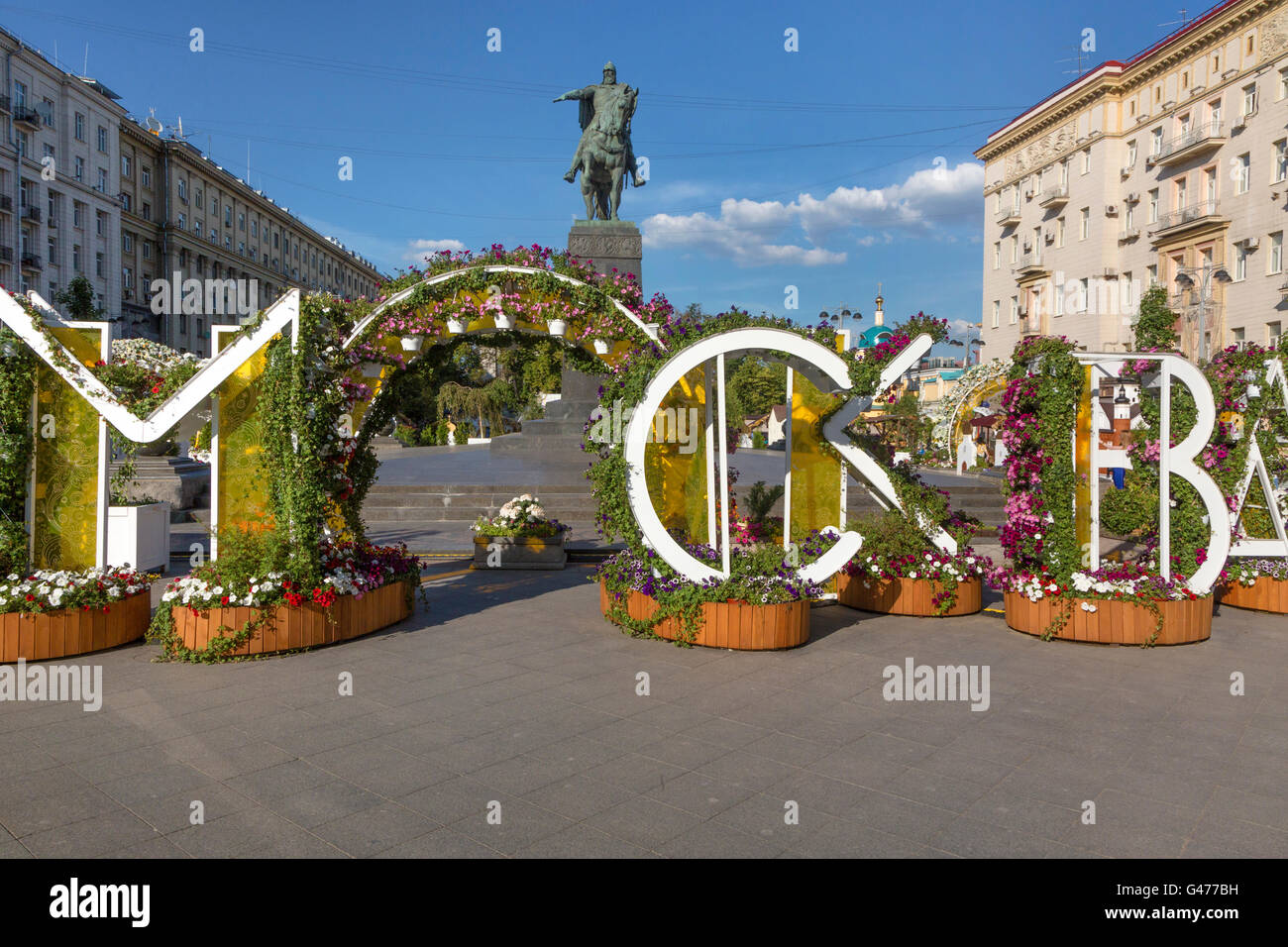 View of the monument to Yury Dolgoruky on Tverskaya Street in Moscow with flowers decoration on summer season festival, Russia Stock Photo