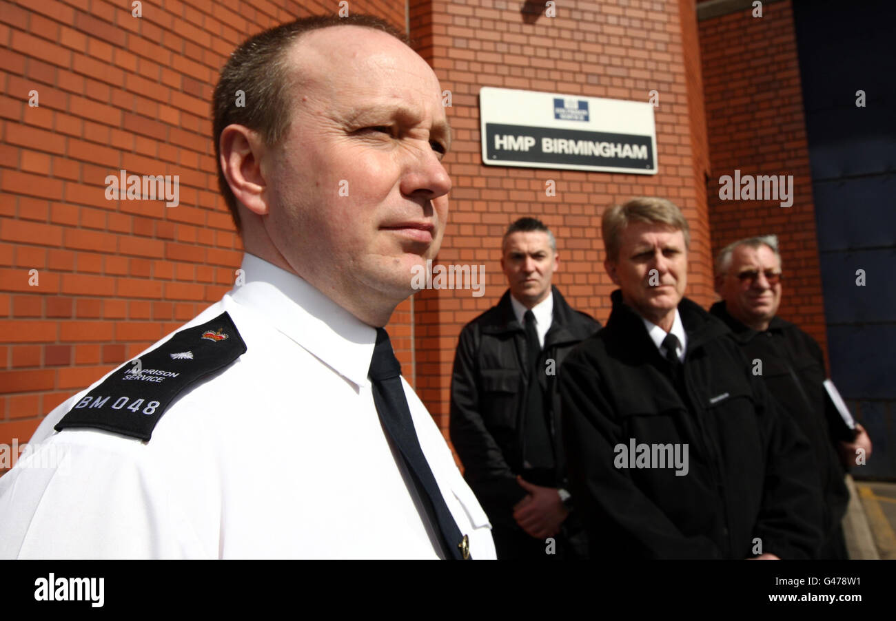 Prison officers gather outside HMP Birmingham on the day that the government announced plans to privatise jails, sparking threats of industrial action. Stock Photo