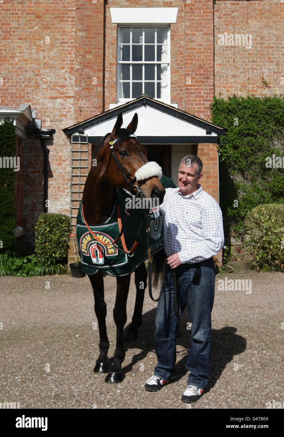 Donald Trainer Trainer Donald McCain Jnr (right) stands alongside Grand National ...
