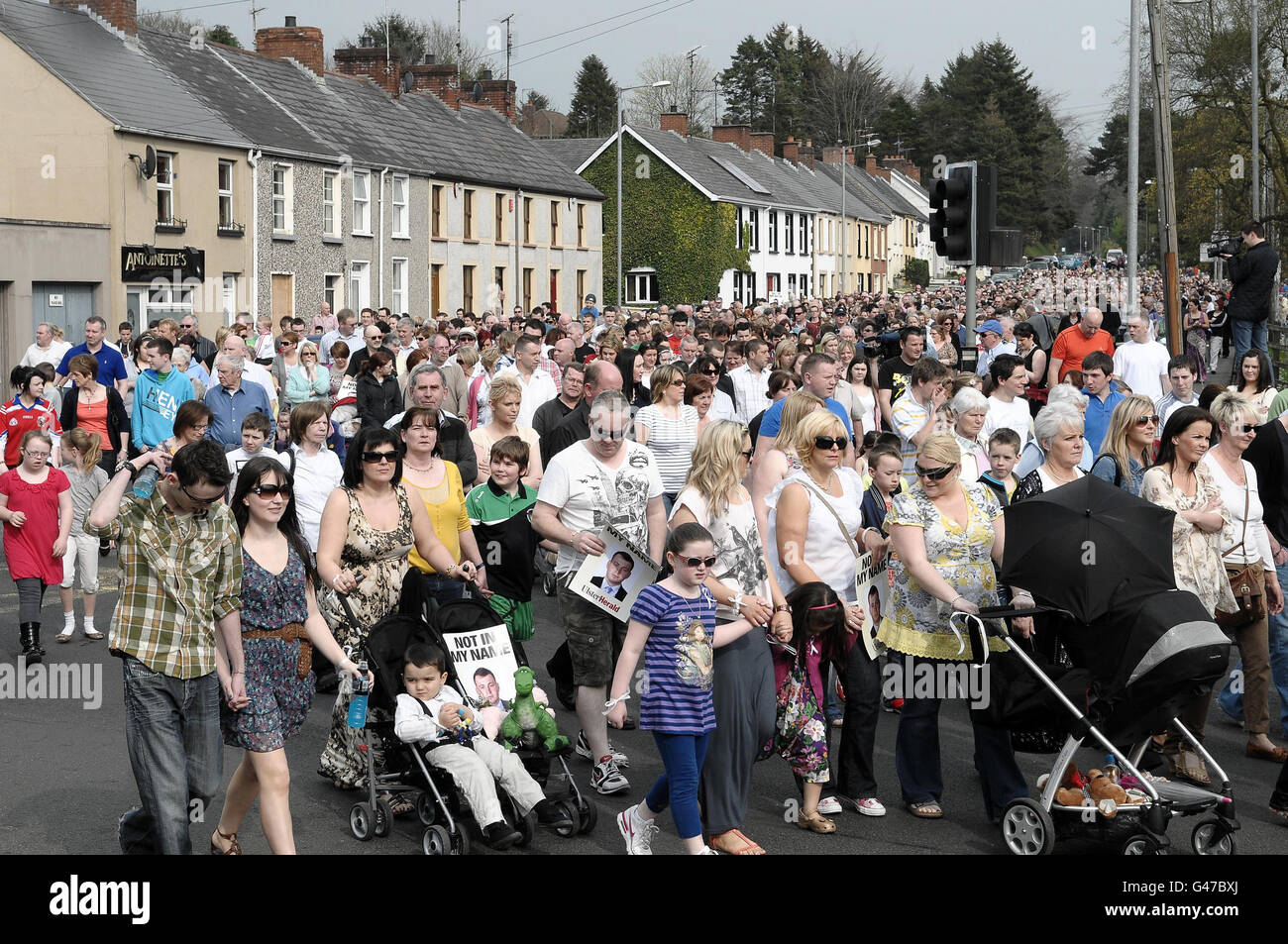 Thousands of people gather in Omagh for a peace walk to mark the death of Northern Ireland police officer Ronan Kerr, who was killed in a car bomb explosion. Stock Photo
