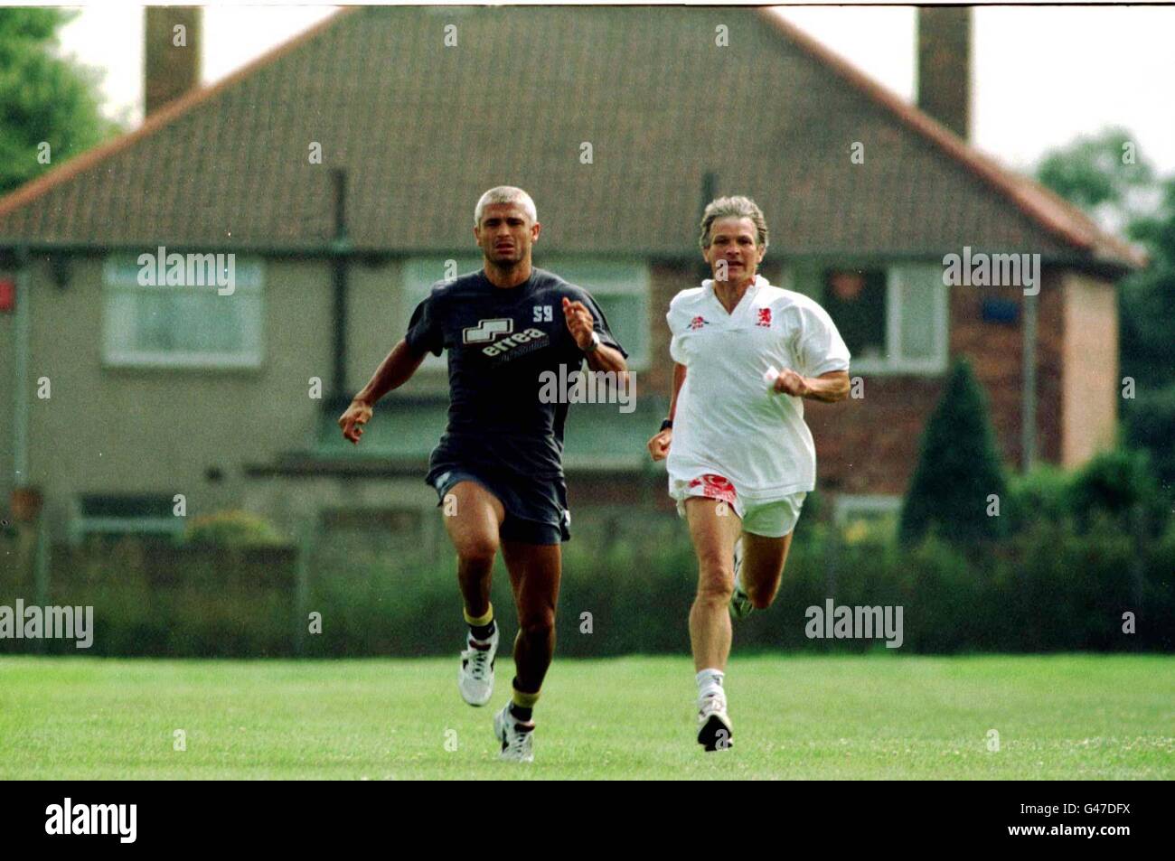 Middlesbrough's Fabrizio Ravanelli (left) during his pre-season training session with fitness trainer John Emmett, today (Weds), after renewing his terms yesterday with manager Bryan Robson. Photo Owen Humphreys/PA. Stock Photo