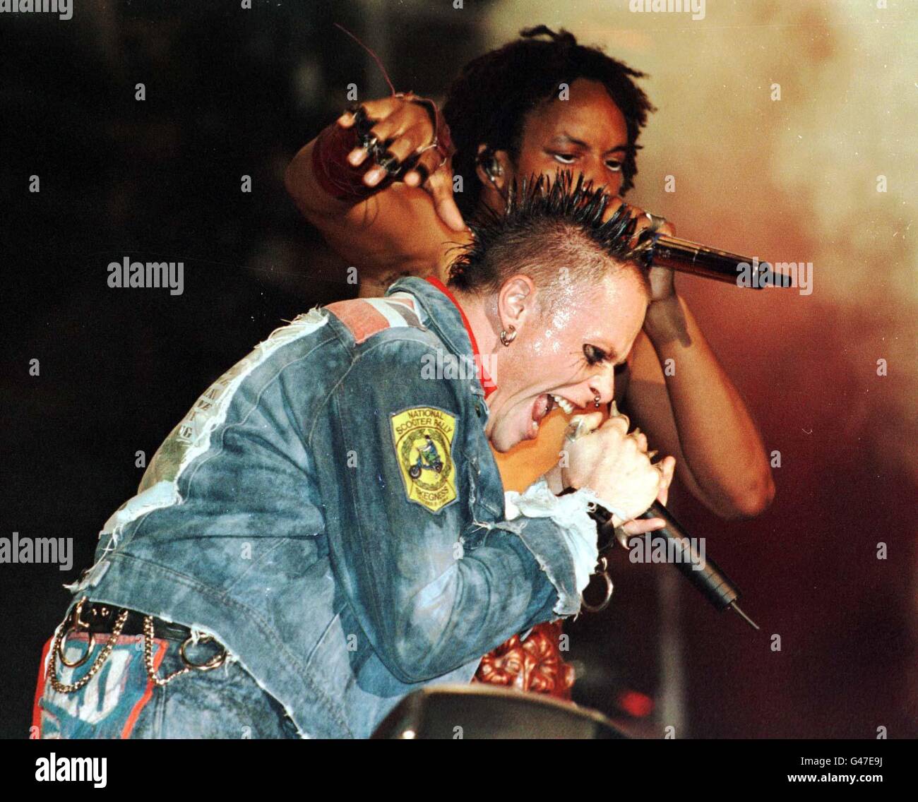 Keith Flint (front), lead singer of The Prodigy, performs at the V97 concert at Temple Newsham, Leeds last night (Saturday). Photo Owen Humphreys/PA. Stock Photo
