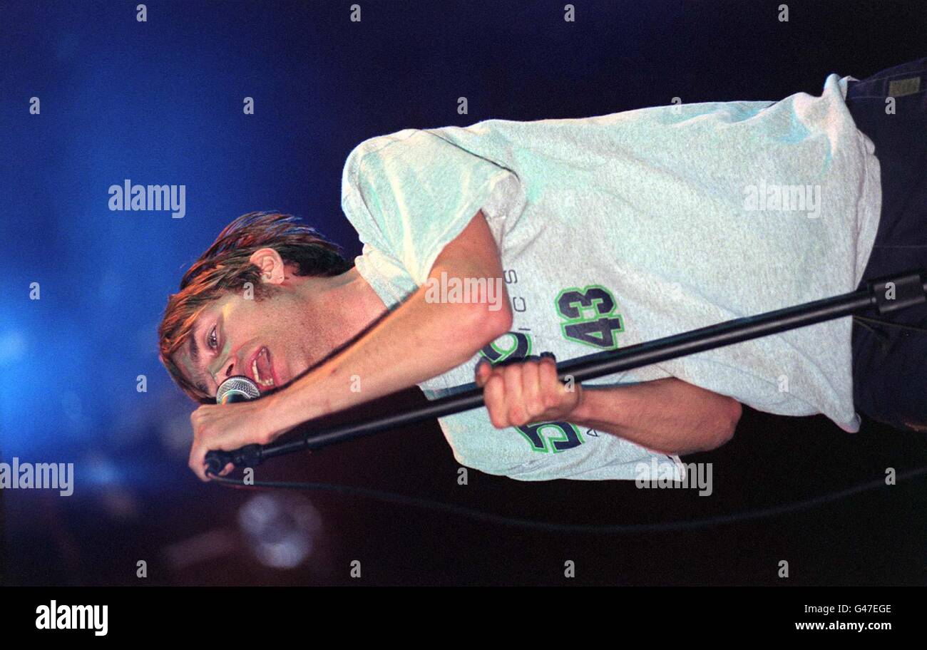Blur frontman Damon Albarn proforming during tonight's (Saturday) V97 concert at Hylands Park Chelmsford. Photo by Neil Munns/PA. Stock Photo