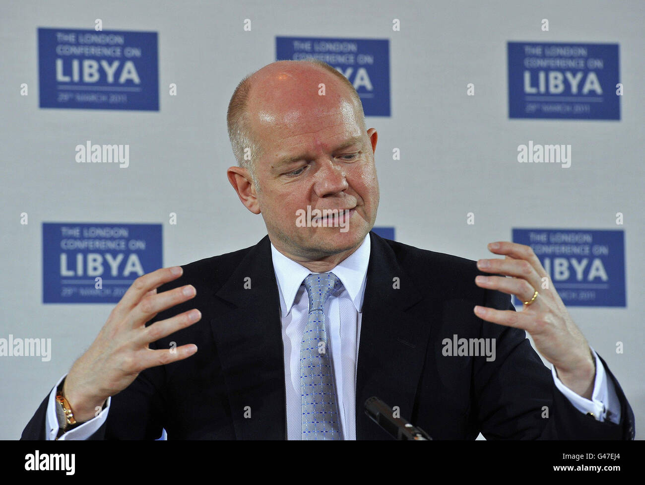 Foreign Secretary William Hague speaks during a news conference after the Libya Conference at the Foreign & Commonwealth Office in London. Stock Photo