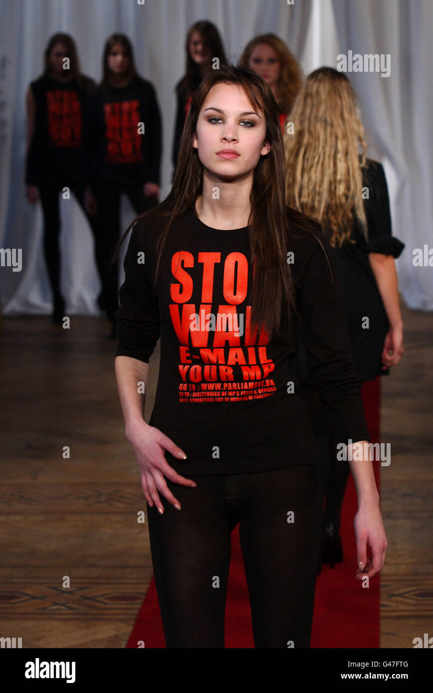 Alexa Chung wears a creation by designer Katharine Hamnett during her  autumn/winter 2003 collection catwalk show as part of London Fashion Week  at Grosvenor Place in London Stock Photo - Alamy