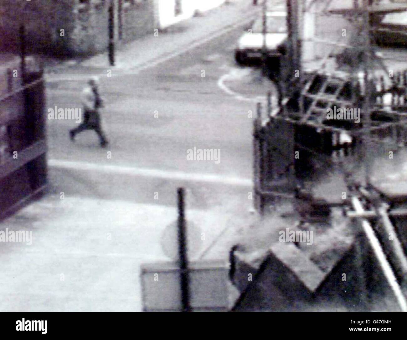 An indistinct image of a figure, thought to be the murderer of young Macedonian refugee, Katerina Konev, is caught on a security video. Twelve year-old Katerina was strangled and left to die at her home in Iffley Road, Hammersmith, West London last Thursday (May 22). Watch for PA story. Available in black and white only. Stock Photo