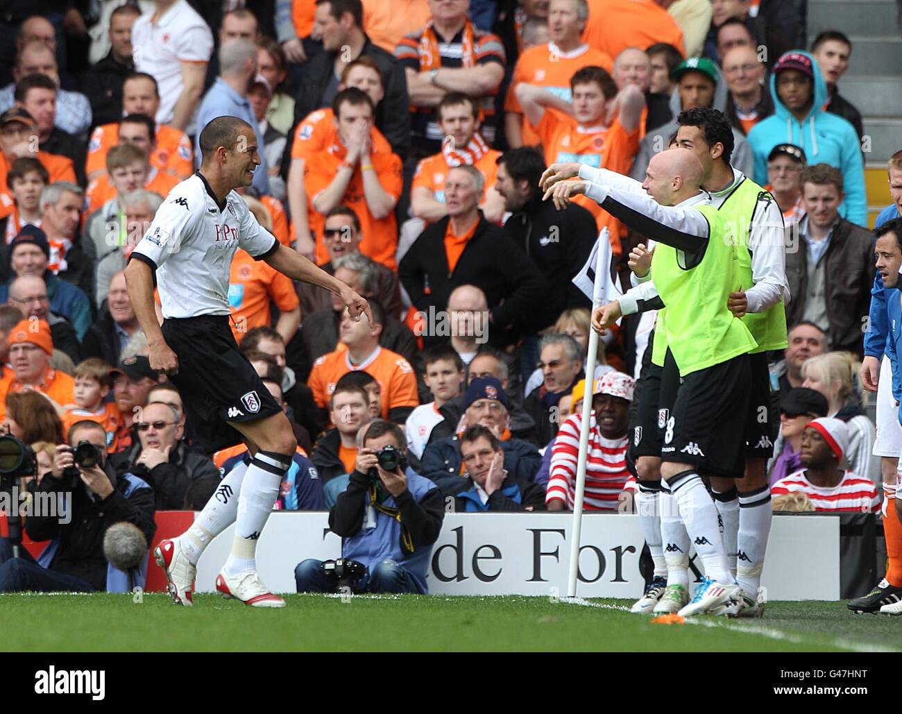 Fulham's Bobby Zamora (left) runs to the side of the pitch to celebrate scoring their first goal with team-mate Andrew Johnson (right) Stock Photo