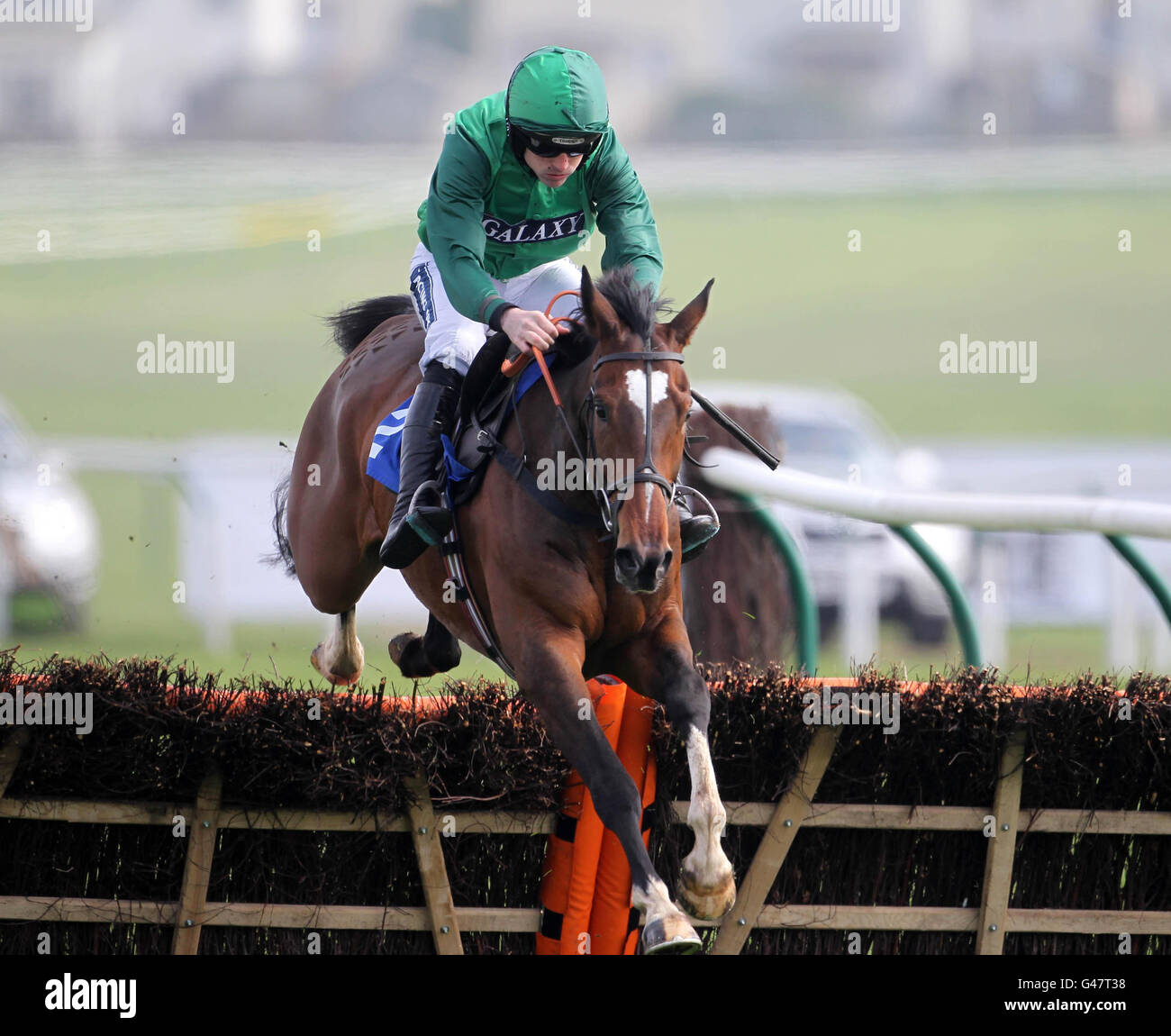 Tonic Mellysse ridden by R Walsh wins The West Sound Juvenile Hurdle Race during day one of the Coral Scottish Grand National Festival at Ayr Racecourse. Stock Photo