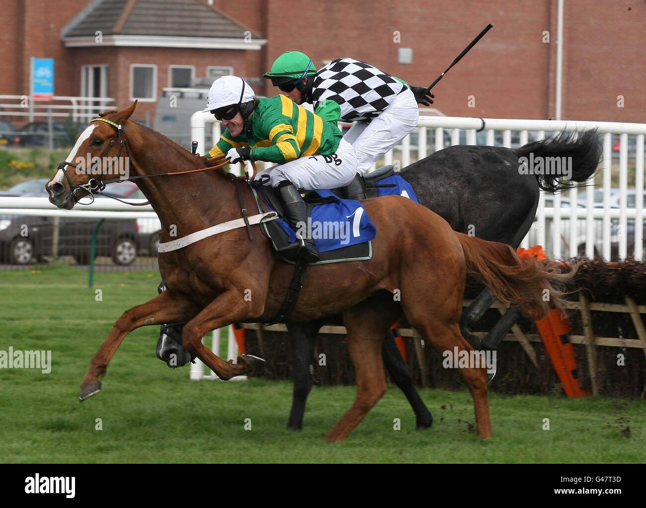 RememberNow ridden by Tony McCoy wins The Tam O'Shanter Poppyscotland Handicap Hurdle Race during day one of the Coral Scottish Grand National Festival at Ayr Racecourse. Stock Photo