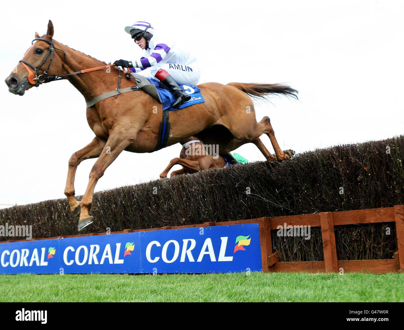 Beshabar ridden by Richard Johnson goes on to win The Coral Scottish Grand National Handicap Steeple Chase during day one of the Coral Scottish Grand National Festival at Ayr Racecourse, Ayr. Stock Photo