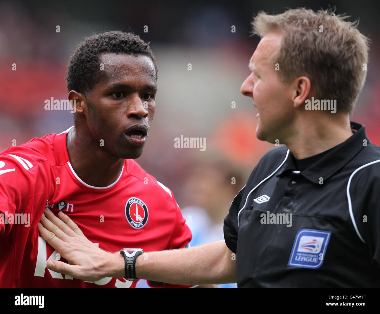 Charlton Athletic's captain Jose Semedo with referee Langford during the npower Football League One match at The Valley, London. Stock Photo