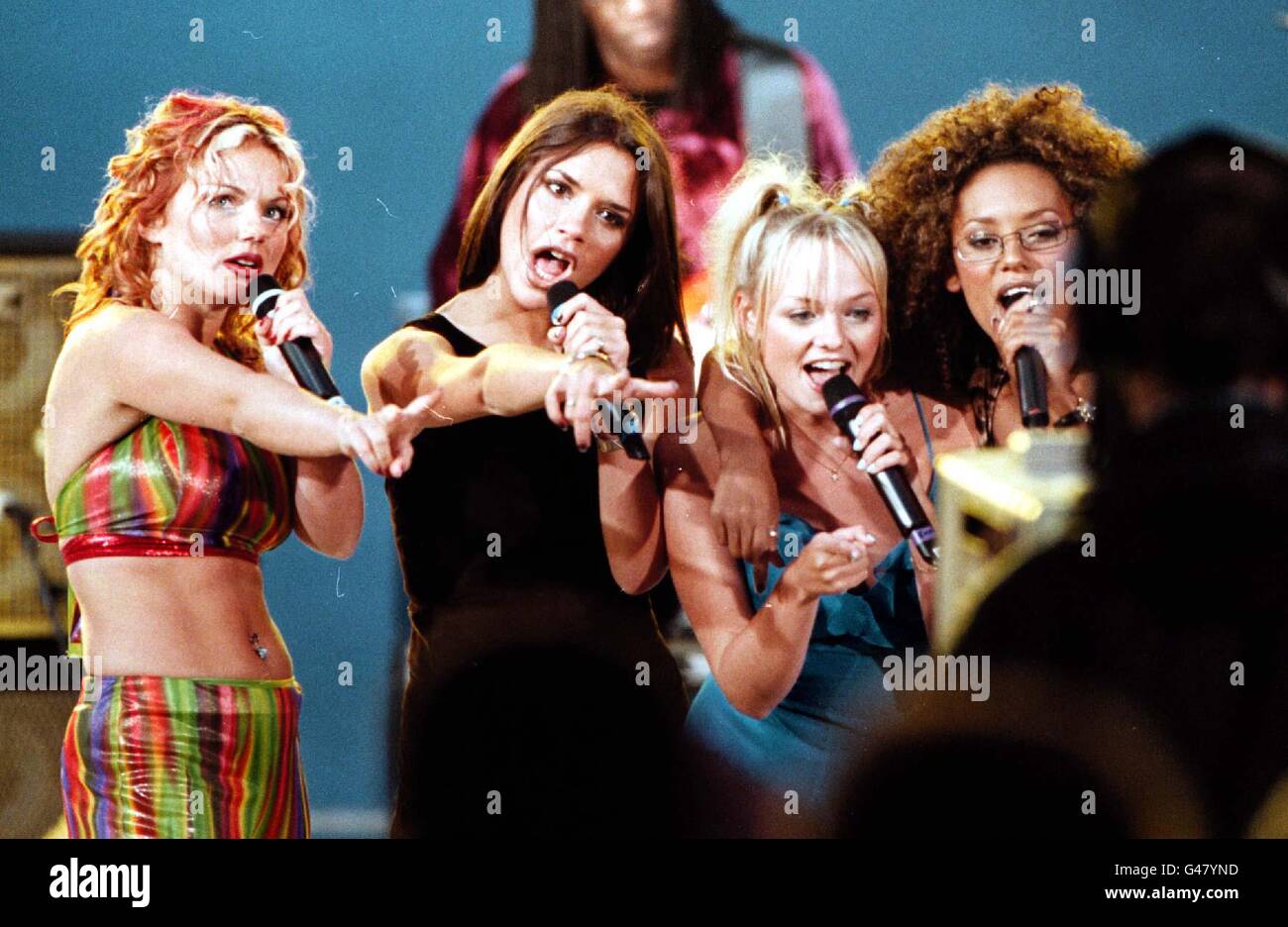 The Spice girls perform live on Canal Plus TV in France at the Cannes Film Festival. (L/R) Ginger Spice Geri Halliwell, Posh Spice Victoria Adams, Baby Spice Emma Bunton and Scary Spice Mel B. Stock Photo