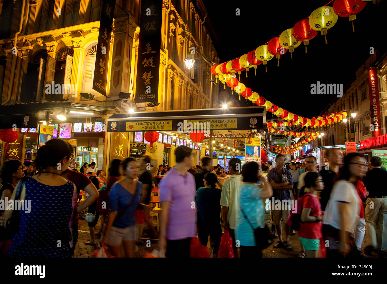 Singapore, Singapore - January 17, 2016: Chinatown attracts a crowd during Chinese New Year festivities. Stock Photo