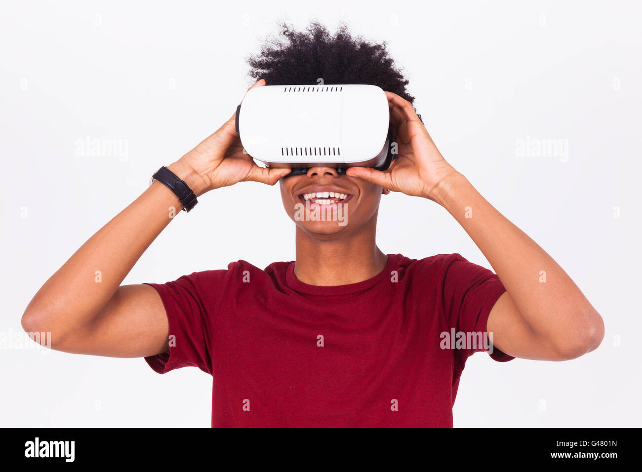 African American young man wearing vr virtual reality headset over ...