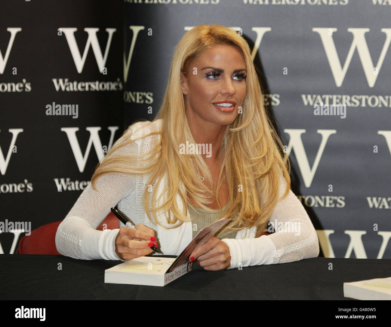 Katie Price during a book signing for her latest autobiography You Only Live Once, and new novel, Paradise, at Waterstone's in Basildon, Essex. Stock Photo