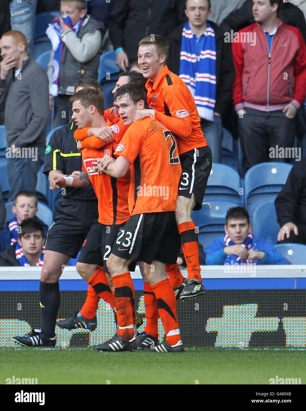 Dundee United's David Goodwillie celebrates the winning goal during the Clydesdale Bank Scottish Premier League match at Ibrox Stadium, Glasgow. Stock Photo
