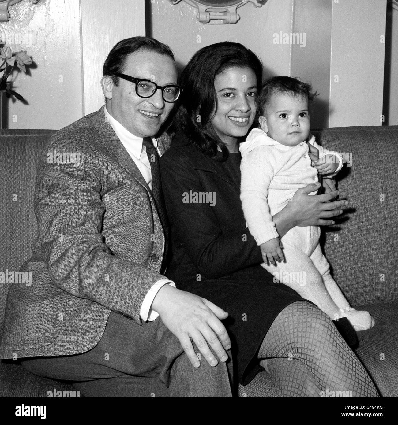 Sidney Lumet, the film director, with his wife, Gail and their 13 month old daughter Amy, on arrival at Southampton aboard the liner SS United States from New York. Stock Photo