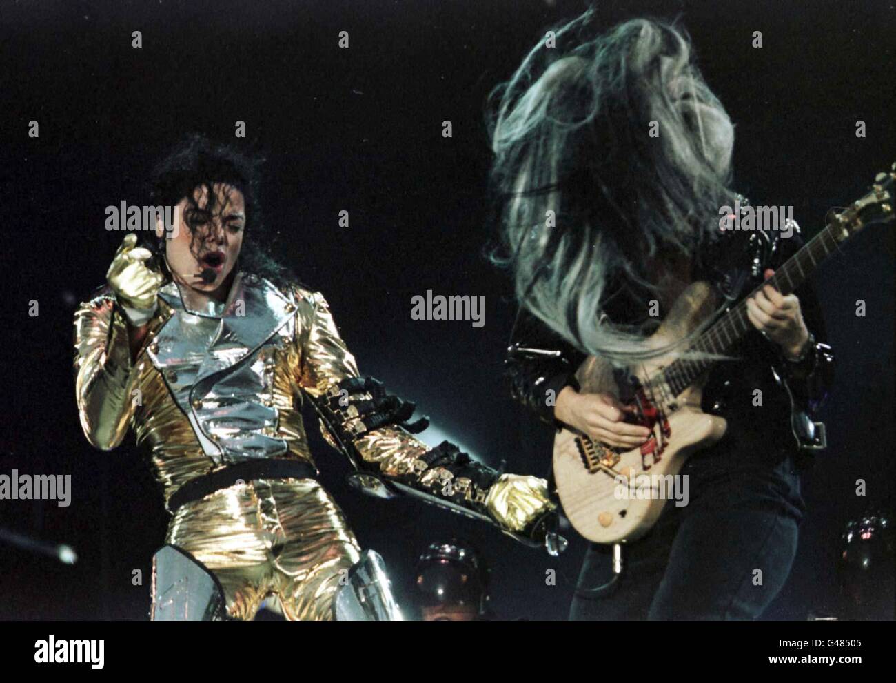 FOR EDITORIAL USE ONLY IN CONNECTION WITH COVERAGE OF TONIGHT'S CONCERT (ONE USE ONLY) : American super star Michael Jackson on stage at the Don Valley Stadium, Sheffield, during the first of his concerts this evening (Wednesday). Photo by Owen Humphreys/PA. Stock Photo