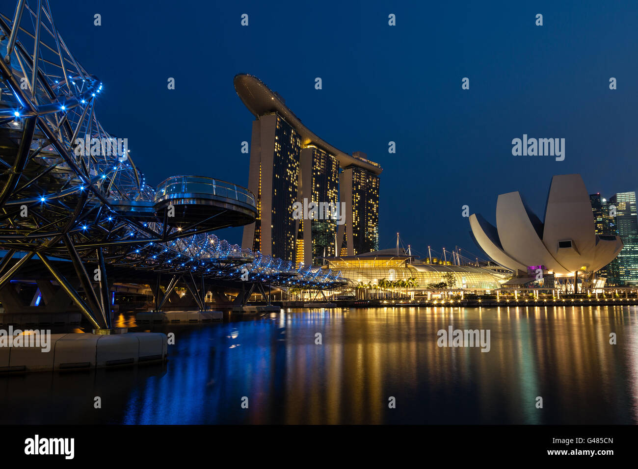 Helix Bridge leading to Singapore's Marina Bay Sands Hotel at the Marina Bay. Stock Photo