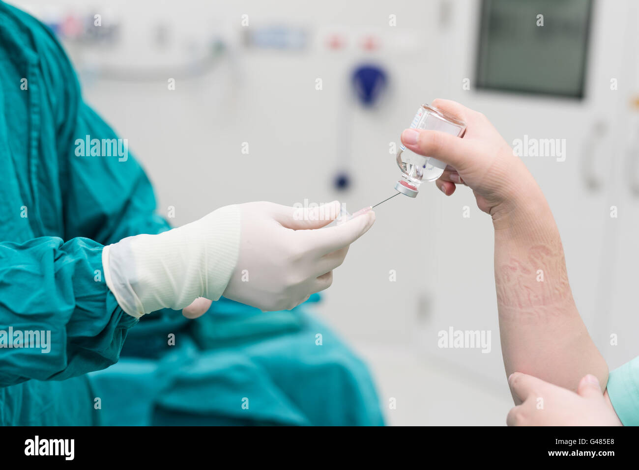 scrub nurse preparing medical instruments for operation Stock Photo Alamy