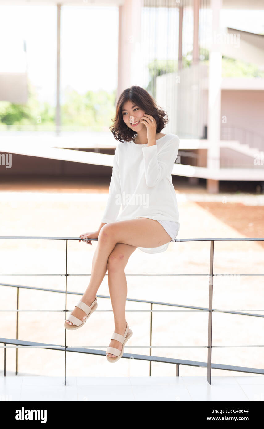 asian woman using smartphone Stock Photo - Alamy