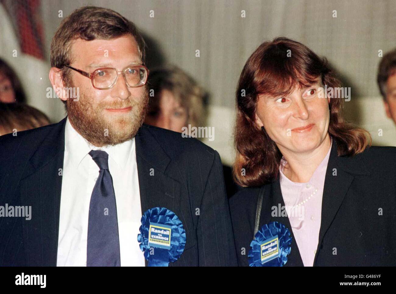 Conservative candidate John Randall and his wife Kate, listen to speeches following the result of last nights Uxbridge by-election. * Mr Randall held on to the Tory seat with a comfortable majority of 3,766 votes, enabling the Conservatives to celebrate their first Parliamentary by-election triumph for eight-and-a-half years. * 10/03/2003: Tory whip John Randall has resigned because he does not consider a case has been made out for war on Iraq, he announced Monday March 10, 2003. He is the first opposition MP to have taken such a step on this issue, although there are some Conservative Stock Photo