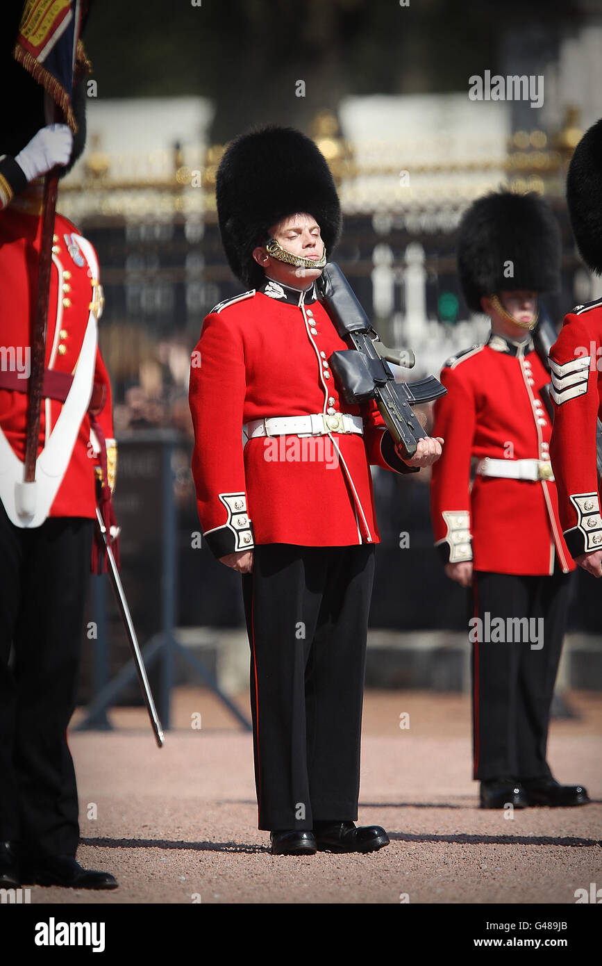 A member of the Scots Guards feels the heat during the Changing of the