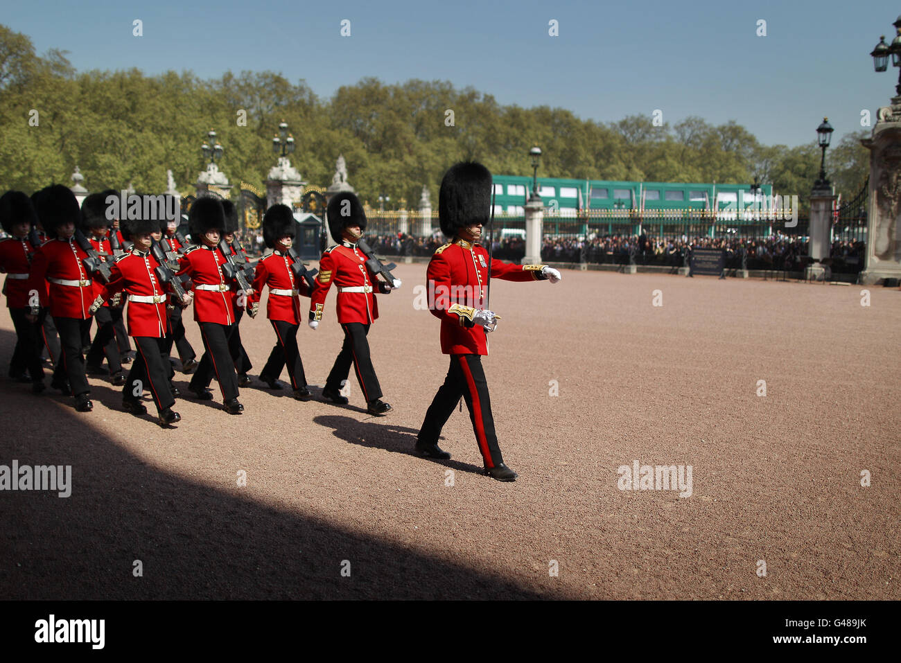 Members of the Scots Guards march during the Changing of the Guard ceremony at Buckingham Palace in London. Stock Photo