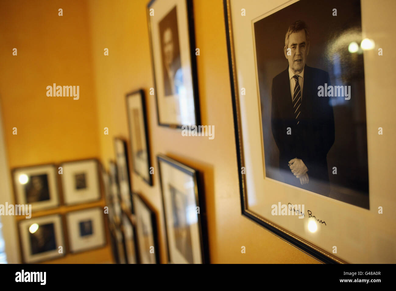 A photographic portrait of former British Prime Minister Gordon Brown hangs at Number 10 Downing Street in London, England. Stock Photo