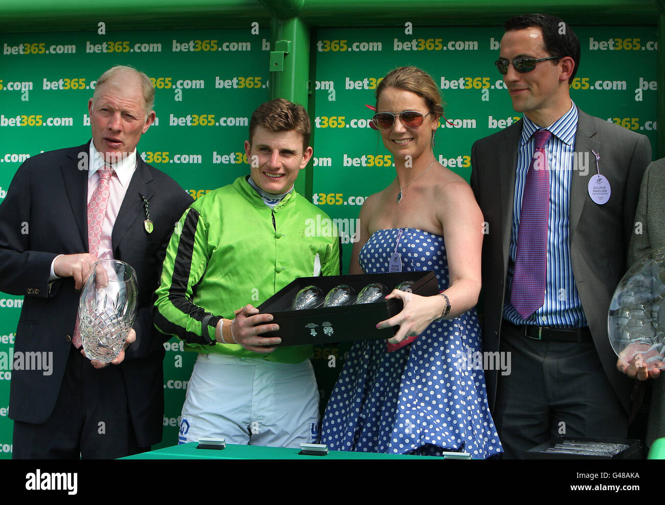 Trainer Gary Moore (left) and Jockey Jamie Moor (2nd left) pose with