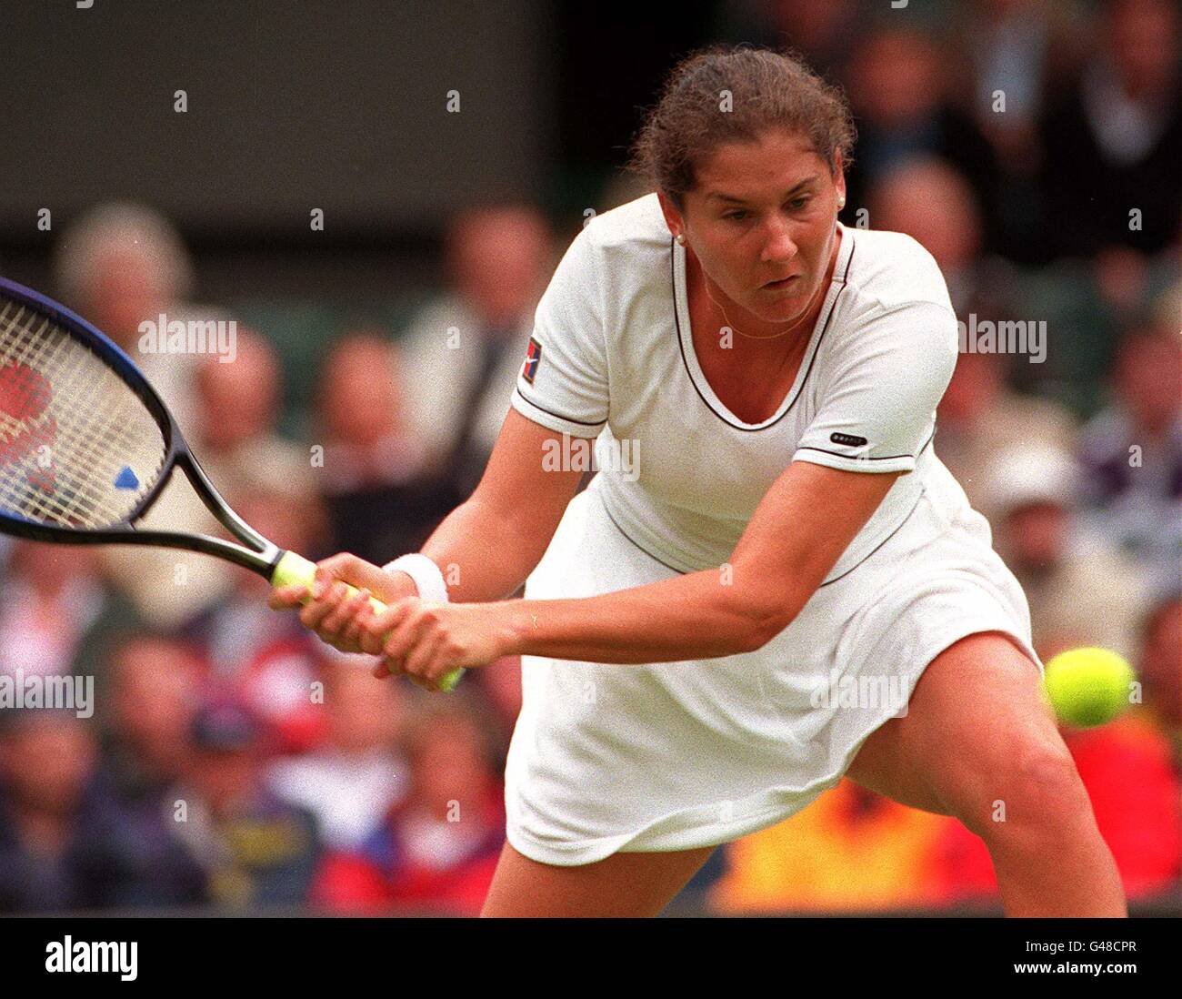 America's Monica Seles returns a shot to Australia's Rachel McQullian(09)