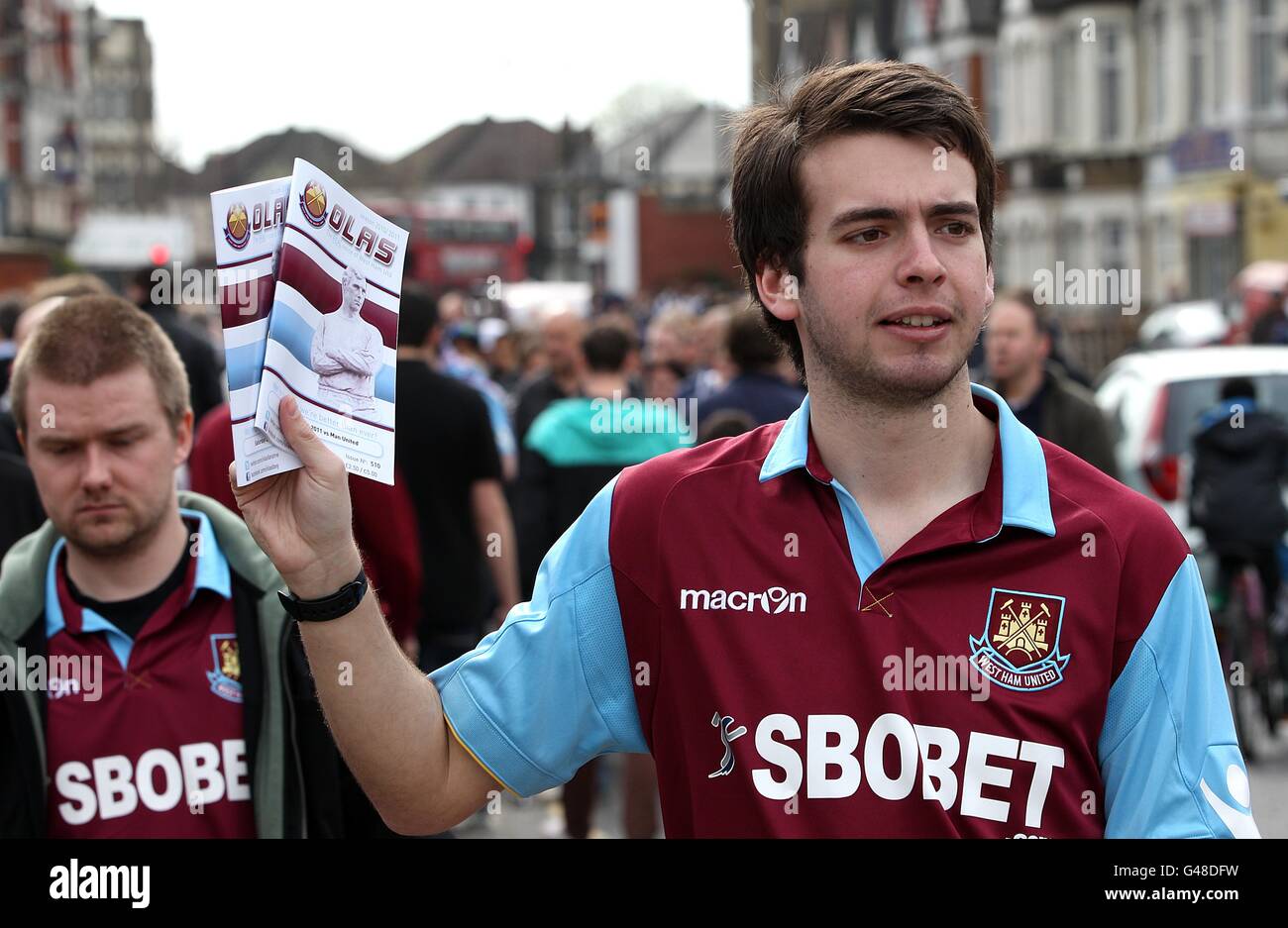Copies of Over Land And Sea West Ham United fanzine on sale outside Upton  Park Stock Photo - Alamy