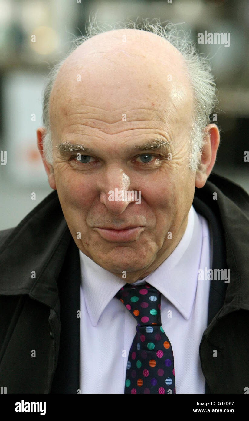 Business Secretary Vince Cable during a visit to Spitalfields Market, in east London, to launch the government's Red Tape Challenge campaign. Stock Photo