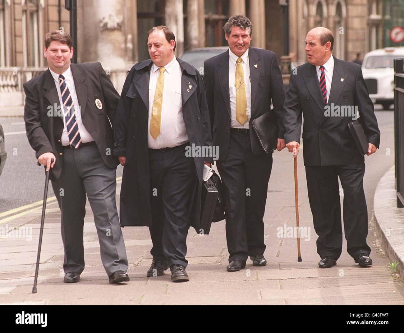 Gulf War veterans, (l to r) Tony Duff, Phil Garner, Ben Gunn and Larry Cammock, leave the Ministry of Defence today (Monday) following a meeting with Defence Secretary George Robertson, who has announced a 6.5 million government initiative to combat Gulf War Syndrome. See PA story DEFENCE Syndrome. Photo by Peter Jordan./PA Stock Photo