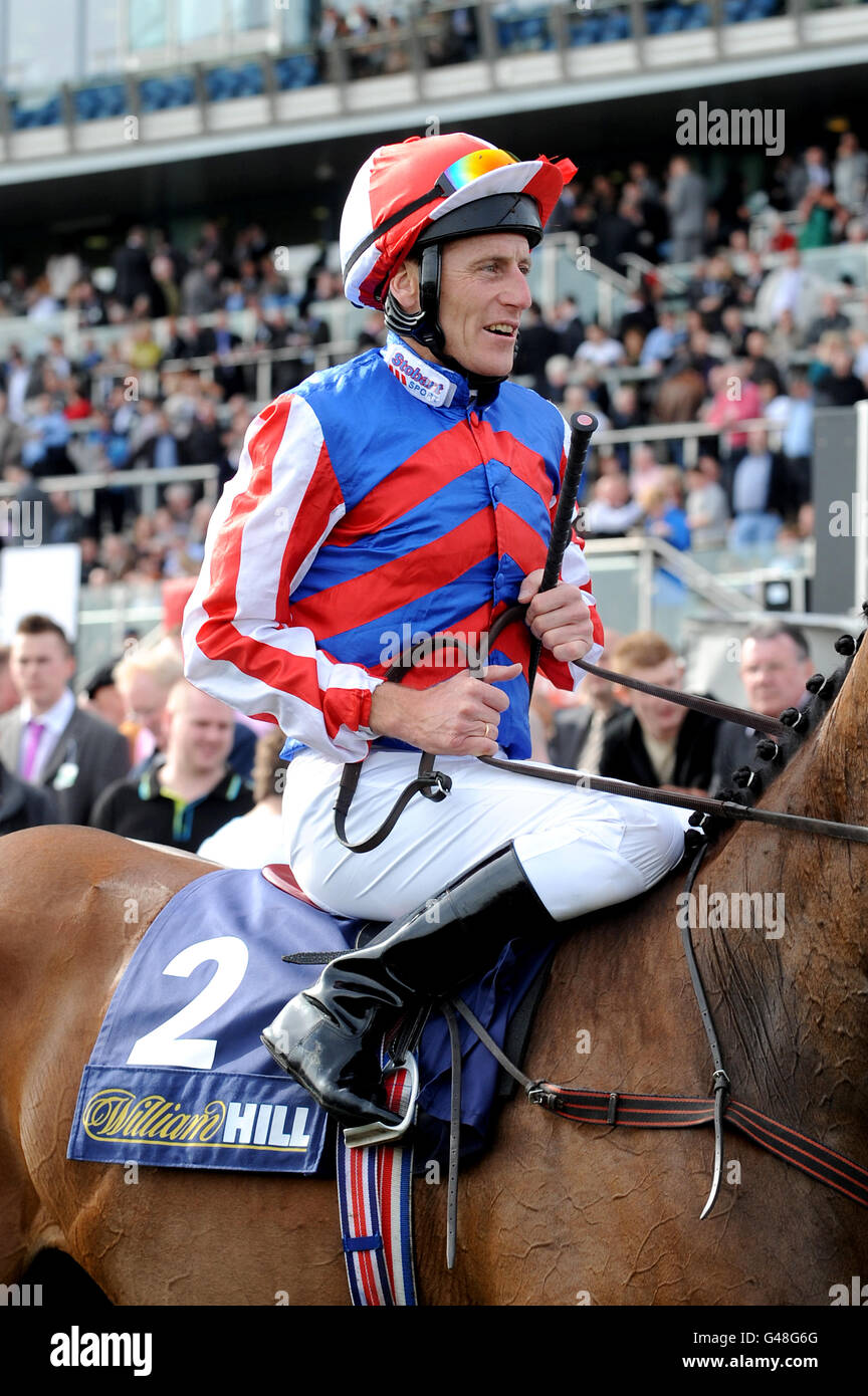 Horse racing races half length mid top jockey smiling hires stock