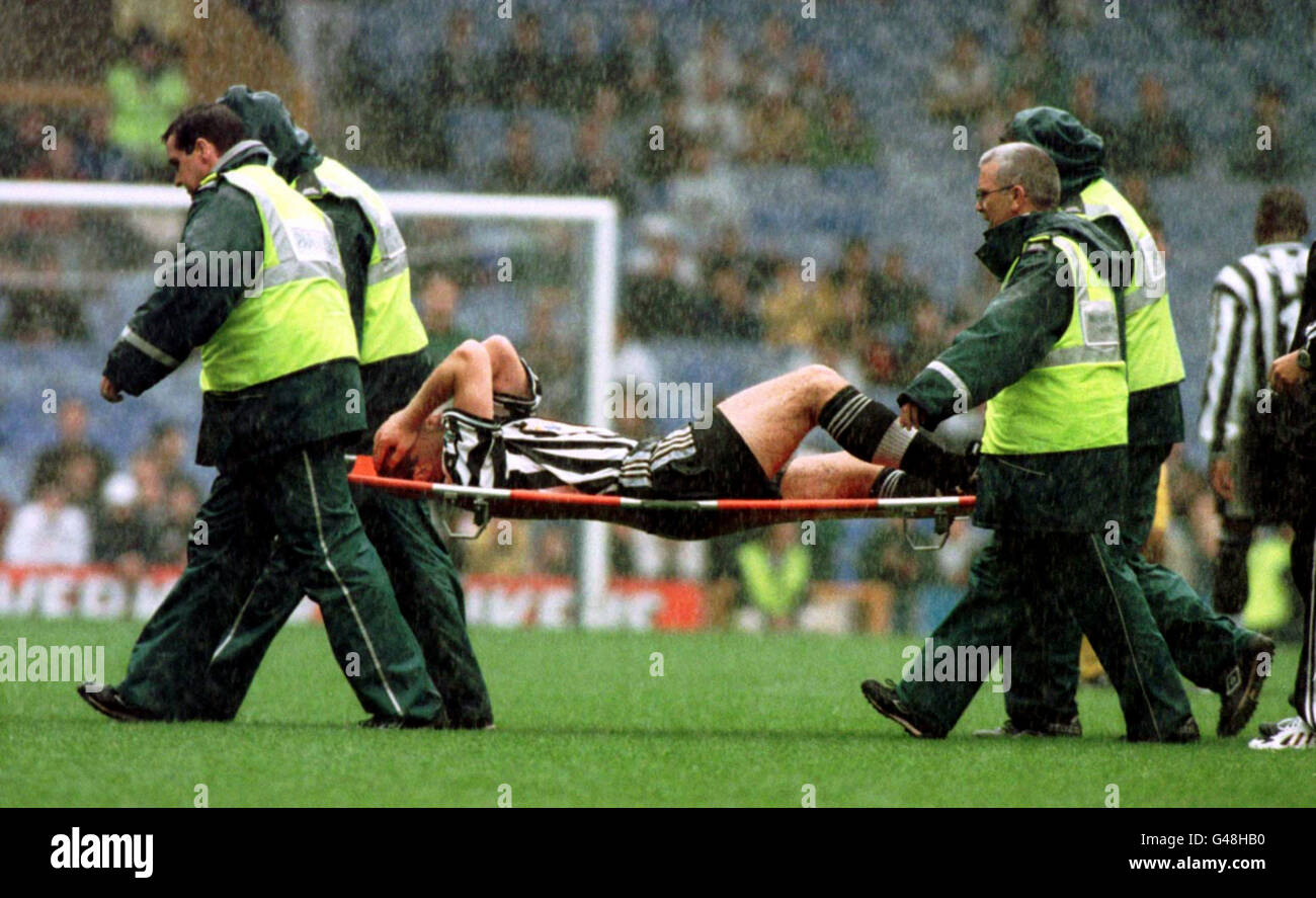 Newcastle striker Alan Shearer is carried off with an ankle injury one  minute from the end of yesterday's (Sat) Umbro tournament match against  Chelsea, at Goodison Park. See PA story SOCCER Shearer. /