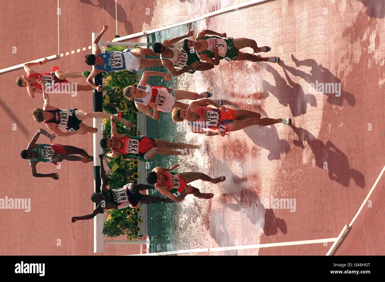 Taking the Water Jump in the first round of the 3000m Steeplechase in