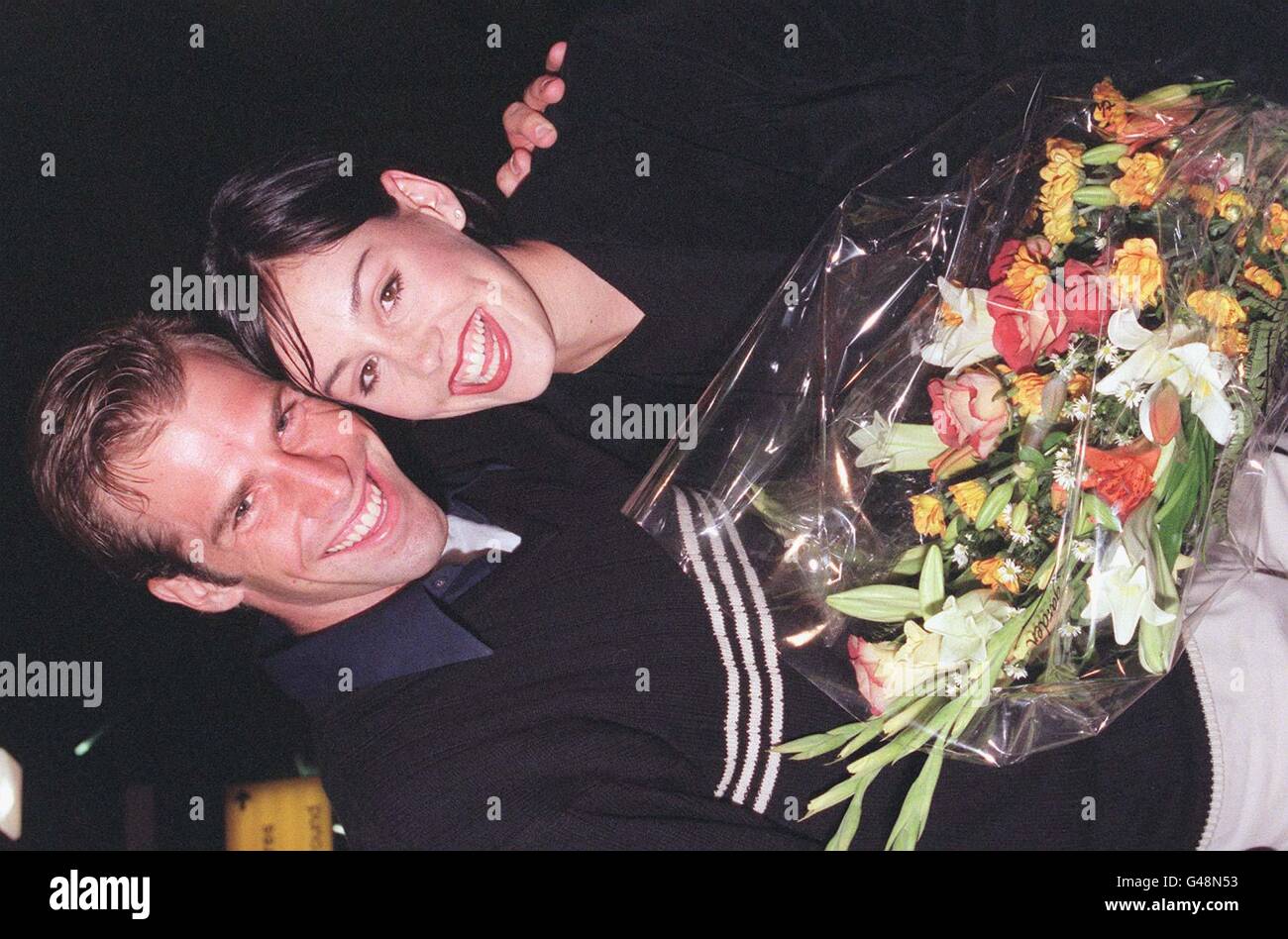 Greg Rusedski arrives at Heathrow airport with girlfriend Lucy Connor ...