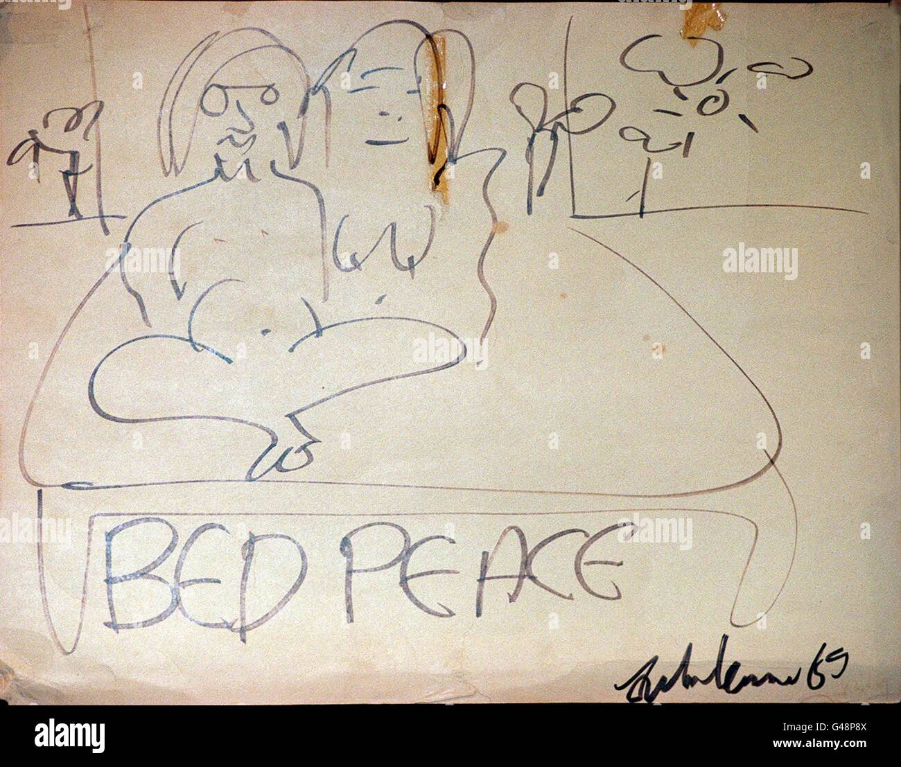 Lot 41, John Lennon 'Bed Peace' an original drawing in black felt pen on white card, signed and dated by John and Yoko. This is one of a number of drawings by John and Yoko which they used to decorate their room in the Queen Elizabeth Hotel Montreal and is expected to fetch 20.000 to 25.000 when it is auctioned by Sotheby's in the Rock'n'Roll Memorabilia Sale on Tuesday 16th September. Photo by Fiona Hanson/PA. Watch for PA Story Stock Photo