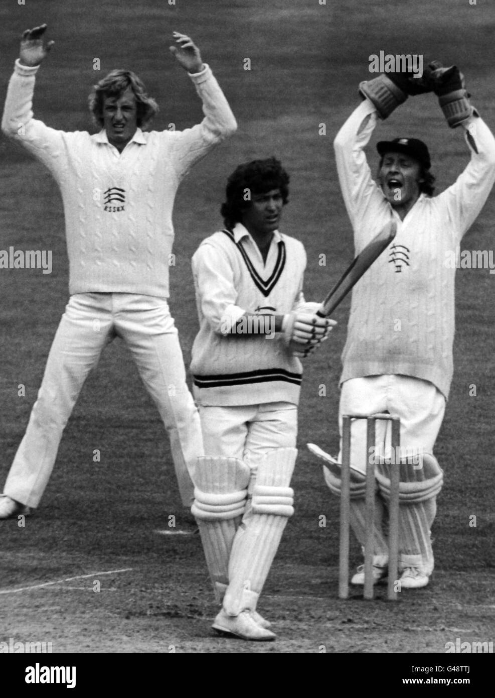 It's 'Howzat!' from Essex wicket-keeper Neil Smith and first slip, Stuart Turner as Norman Featherstone of Middlesex is LBW to Robin Hobbs for 30 in the match. Stock Photo