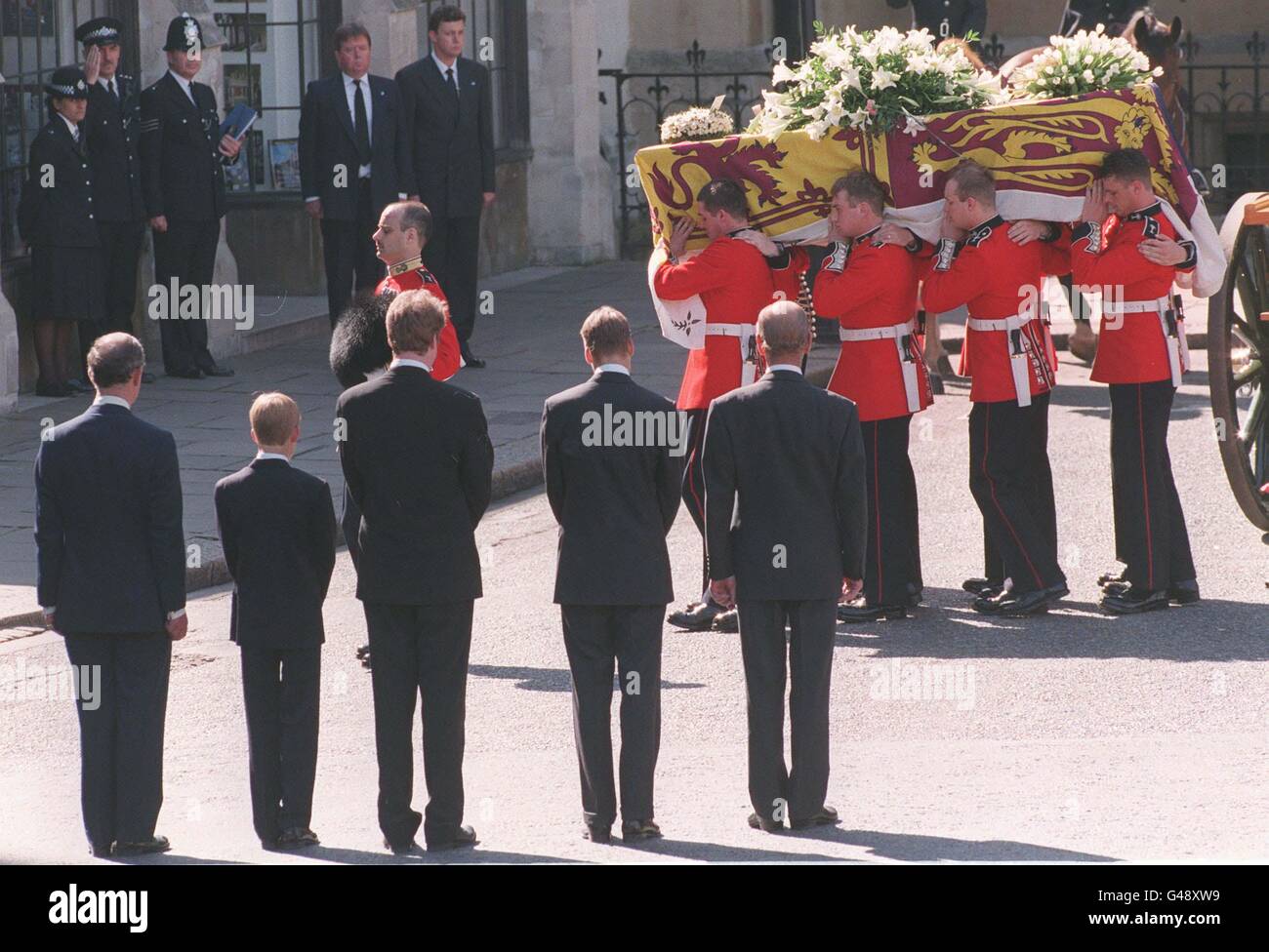 LON36 Prince Charles (left) Prince Harry, Earl Spencer, brother of the Princess of Wales the Duke of Edinburgh and Prince William, watch as the coffin of the Princess of Wales is carried into Westminster Abbey 06 September. The Princess died in a car crash 31st August in Paris.JOBINE:AFP POOL Stock Photo